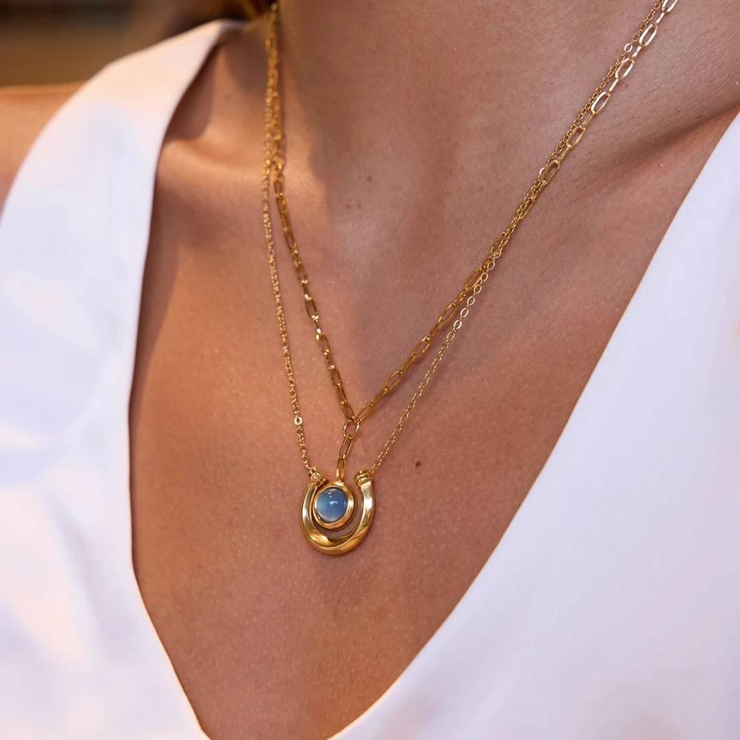 Collar doble colgante herradura cristal azul