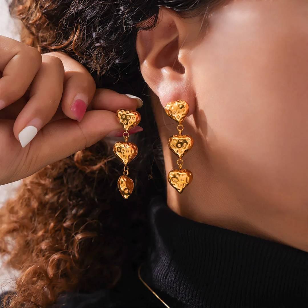 Aretes tres corazones